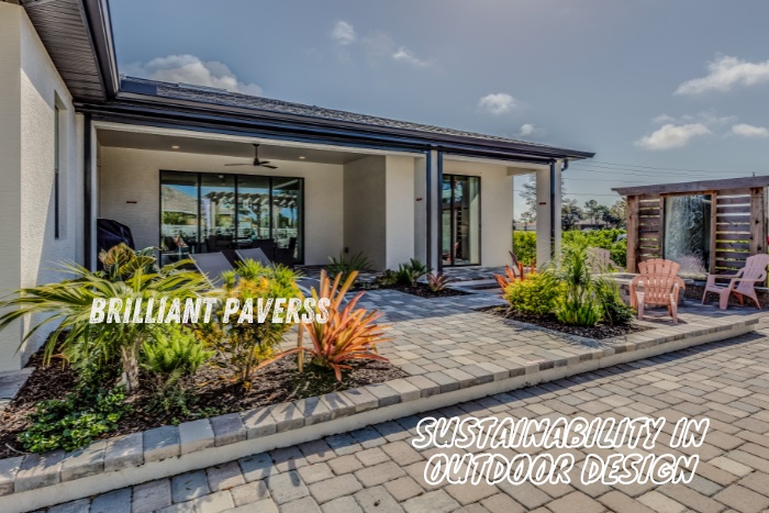 A beautifully landscaped outdoor patio featuring sustainable paver designs from Brilliant Paverss in Coimbatore. The image showcases a stylish and eco-friendly space with neatly arranged pavers, vibrant greenery, and cozy seating areas. It reflects Brilliant Paverss' commitment to sustainability in outdoor design, offering environmentally conscious solutions that enhance the aesthetic and functionality of residential spaces